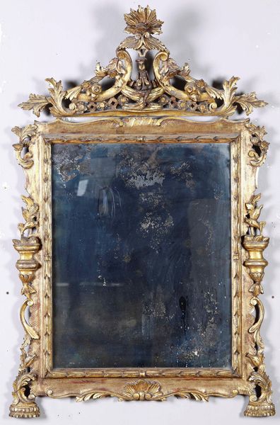 Specchiera in legno intagliato e dorato. XIX-XX secolo  - Asta Antiquariato Giugno - Associazione Nazionale - Case d'Asta italiane