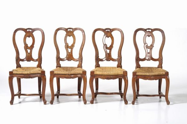 Otto sedie in noce intagliato. XIX-XX secolo  - Asta Antiquariato Giugno - Associazione Nazionale - Case d'Asta italiane