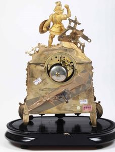 Orologio in bronzo dorato. XIX secolo  - Asta Antiquariato Giugno - Associazione Nazionale - Case d'Asta italiane