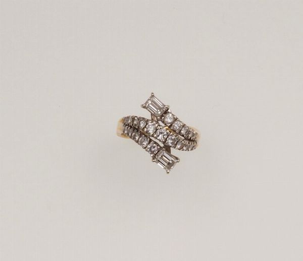 Anello con due diamanti taglio smeraldo e diamanti taglio brillante  - Asta Fine Jewels - Associazione Nazionale - Case d'Asta italiane