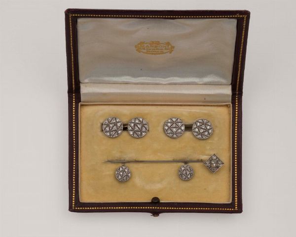 Set composto da un paio di bottoni da polso, bottoni da sparato e spillone da cravatta  - Asta Fine Jewels - Associazione Nazionale - Case d'Asta italiane