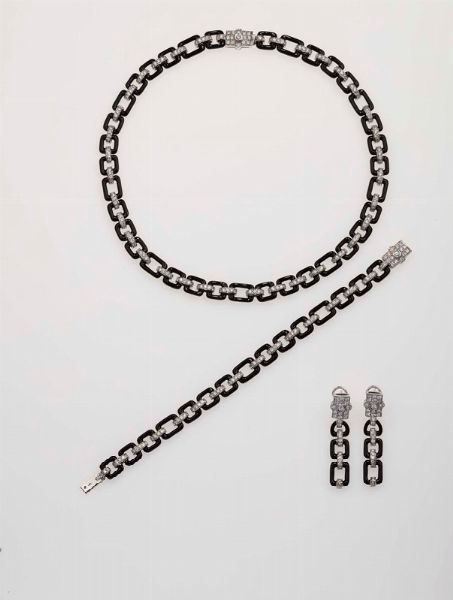 Parure composta da girocollo, bracciale ed orecchini in smalto e diamanti  - Asta Fine Jewels - Associazione Nazionale - Case d'Asta italiane