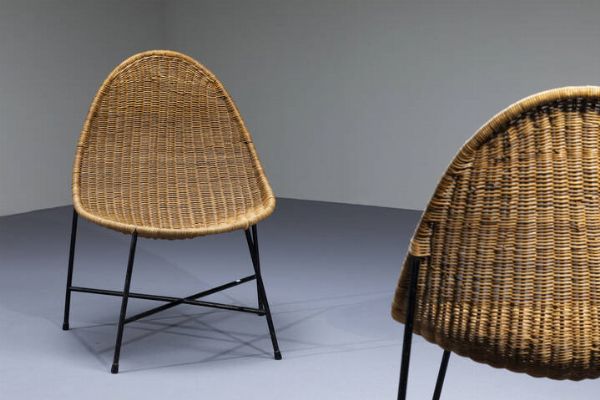 KERTIN HORLIN HOLMQUIST : Coppia di poltrone con struttura in metallo verniciato  scocca in vimini intrecciato. Prod. Nordiska Kompaniet anni '60 cm 84x58x52  - Asta Design - Associazione Nazionale - Case d'Asta italiane