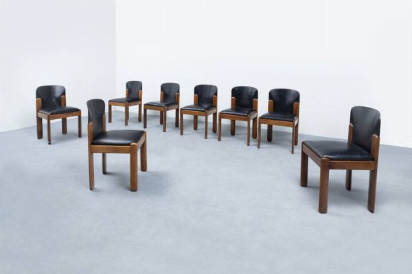 SILVIO COPPOLA : Otto sedie in legno di noce con sedute imbottite rivestite in pelle. Prod. Bernini anni '60 cm 80x45x45 Bibl.: Abitare 72 (gennaio-febbraio 1969)  p. 38 Ottagono 15 (ottobre 1969)  p. 13 Casa Amica 9 novembre 1971  p. 41  - Asta Design - Associazione Nazionale - Case d'Asta italiane