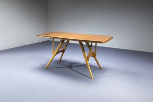 CAMPO & GRAFFI  nello stile di : Tavolo in legno di noce. Anni '60 80x162x73  - Asta Design - Associazione Nazionale - Case d'Asta italiane