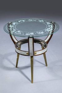PRODUZIONE ITALIANA - Tavolino in legno con piano in vetro decorato con segni zodiacali. Anni '50 cm 54x57