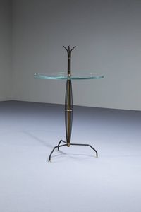 PRODUZIONE ITALIANA - Tavolino con struttura in metallo laccato  piano in vetro molato. Anni '50 cm 76x48
