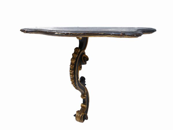 Mensola in legno intagliato ebanizzato e lumeggiato in oro  - Asta L'Arte di Arredare - Associazione Nazionale - Case d'Asta italiane