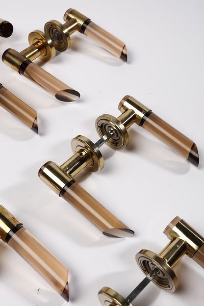 REGA ROMEO (1925 - 1984) : attribuito. Nove maniglie  - Asta Asta 370 | DESIGN E ARTI DECORATIVE DEL NOVECENTO Virtuale - Associazione Nazionale - Case d'Asta italiane