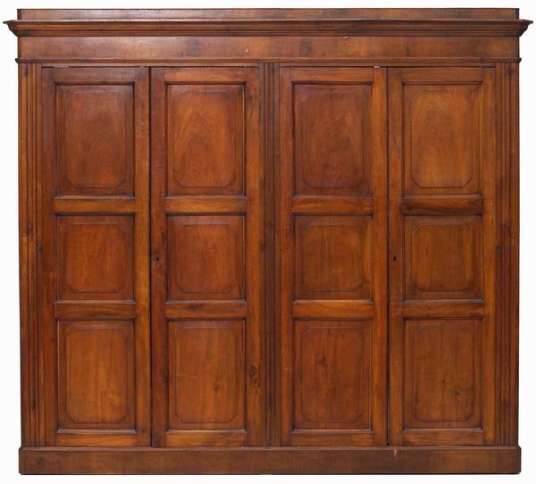 Armadio in legno a quattro ante pannellate. XIX secolo  - Asta Antiquariato Luglio | Cambi Time - Associazione Nazionale - Case d'Asta italiane