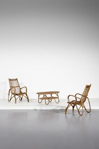 AGNOLI TITO (1931 - 2012) - nello stile di. Coppia di poltroncine con tavolino