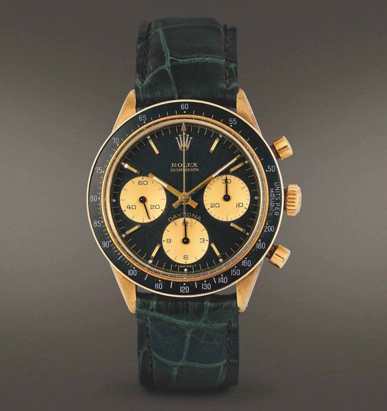 ROLEX - Daytona <BR>Cronografo a carica manuale in oro giallo 14 kt con 3 contatori. Quadrante nero con grafiche oro.  - Asta The One, for passionate only - Associazione Nazionale - Case d'Asta italiane
