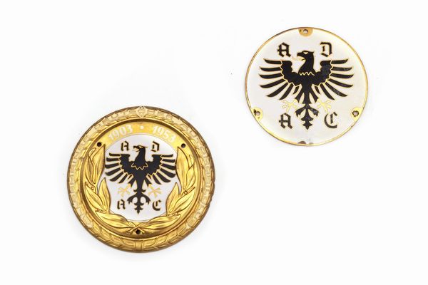 Due placche circolari in metallo dorato e smalti  - Asta Incanti d'Arte - Associazione Nazionale - Case d'Asta italiane