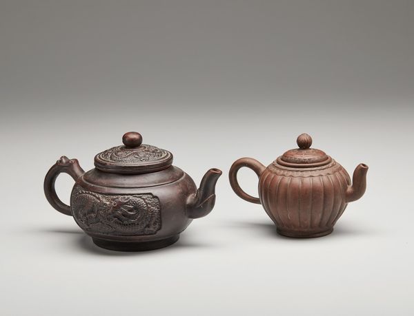 Arte Cinese : Gruppo di quattro teiere Yixing  Cina, prima met� XX secolo  - Asta Asta 373 | ARTE ORIENTALE E ISLAMICA - ARTE ORIENALE E WUNDERKAMMER Online - Associazione Nazionale - Case d'Asta italiane