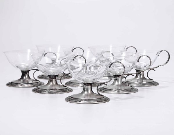 Servito da otto coppette in argento e vetro. Argenteria italiana del XX secolo. Incussa firma Ostorero  - Asta Argenti - Associazione Nazionale - Case d'Asta italiane