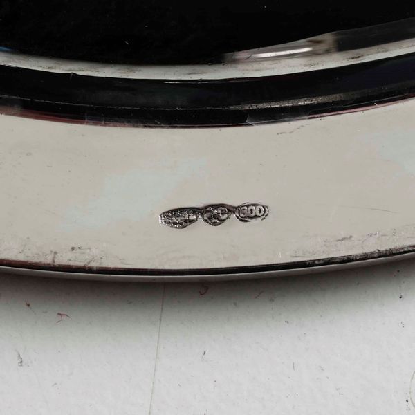 24 piatti in argento (12 di una tipologia e 12 di altra tipologia). Argenteria italiana del XX secolo. Argentiere Ricci & C. Alessandria  - Asta Argenti - Associazione Nazionale - Case d'Asta italiane