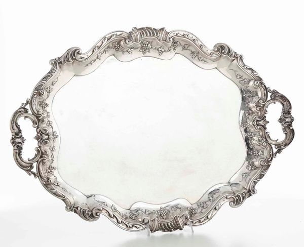Due vassoi in argento e uno in metallo argentato. Varie manifatture del XX secolo<BR>66x43, 52x38, 55.5x37  - Asta Argenti - Associazione Nazionale - Case d'Asta italiane