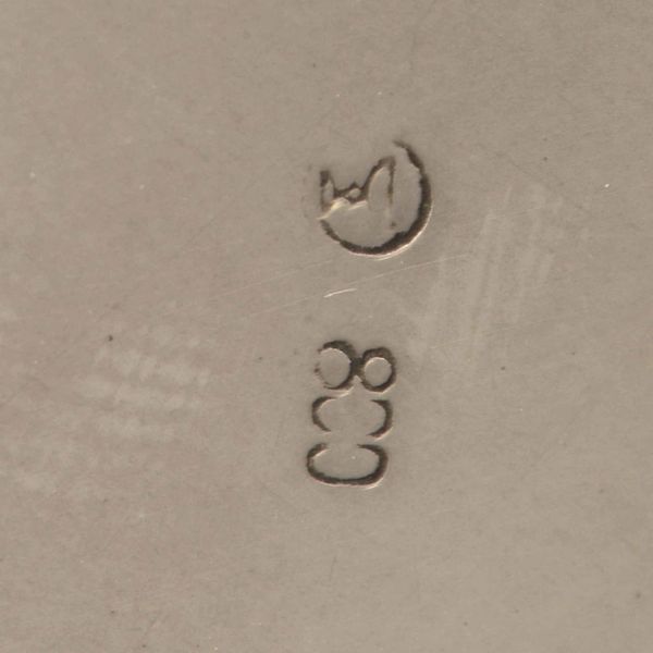 Cestino. Argento fuso e sagomato, manico ad arco in legno ebanizzato. Argenteria artistica italiana del XX secolo  - Asta Argenti - Associazione Nazionale - Case d'Asta italiane