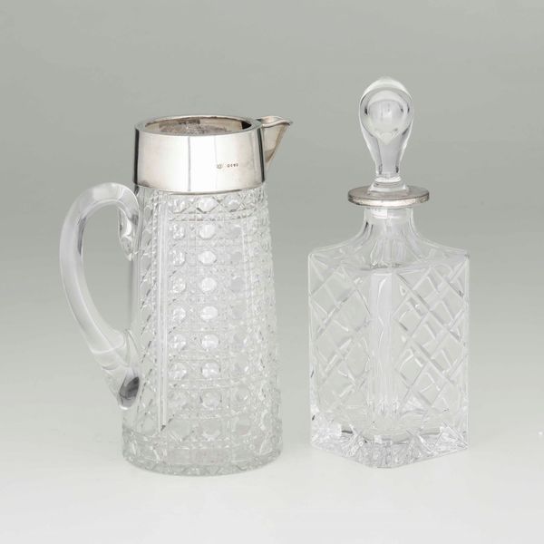 Bottiglia e brocca in vetro molato e argento, manifatture diverse del XX secolo  - Asta Argenti - Associazione Nazionale - Case d'Asta italiane