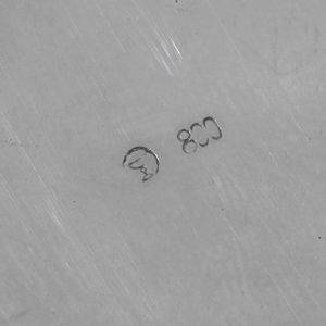 Cestino. Argento fuso e sagomato, manico ad arco in legno ebanizzato. Argenteria artistica italiana del XX secolo  - Asta Argenti - Associazione Nazionale - Case d'Asta italiane