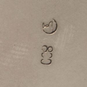 Cestino. Argento fuso e sagomato, manico ad arco in legno ebanizzato. Argenteria artistica italiana del XX secolo  - Asta Argenti - Associazione Nazionale - Case d'Asta italiane