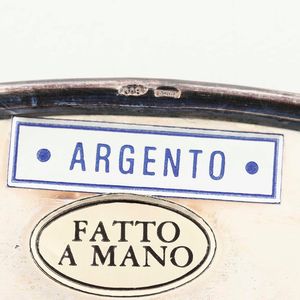 Lotto di tre piatti in argento. Varie manifatture italiane del XX secolo  - Asta Argenti - Associazione Nazionale - Case d'Asta italiane