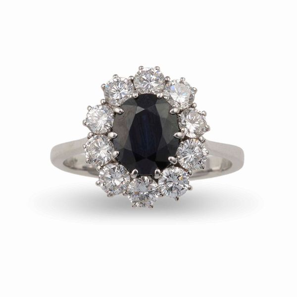 Anello con zaffiro Australia di ct 1.50 circa e diamanti taglio brillante per ct 1.00 circa  - Asta Gioielli - Associazione Nazionale - Case d'Asta italiane