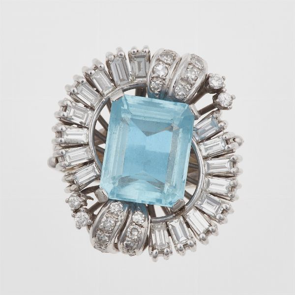 Anello con topazio azzurro di ct 5.20 circa e diamanti a contorno  - Asta Gioielli - Associazione Nazionale - Case d'Asta italiane