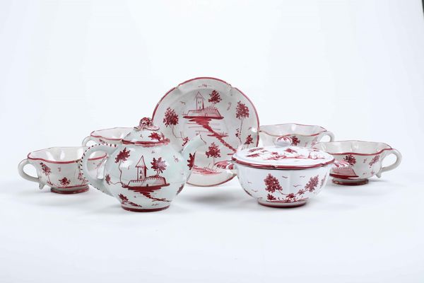 Teiera, zuccheriera, quattro tazze e un piattino <BR>Firenze, Manifattura Cantagalli, prima met del XX secolo  - Asta Maioliche, Porcellane e Vetri - Associazione Nazionale - Case d'Asta italiane