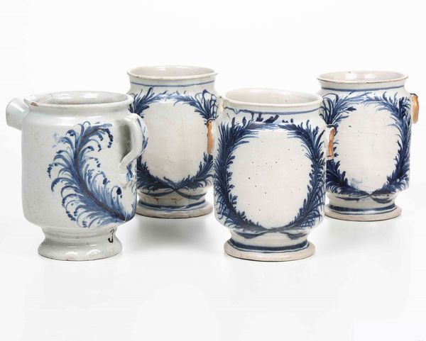 Un versatoio e cinque albarelli<BR>Liguria, XIX secolo  - Asta Maioliche, Porcellane e Vetri - Associazione Nazionale - Case d'Asta italiane