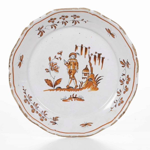 Piatto <BR>Francia, probabilmente Manifattura del Sud - Est, XVIII secolo  - Asta Bacili da barbiere, bacinelle e fioriere in maiolica francese da collezione - Associazione Nazionale - Case d'Asta italiane