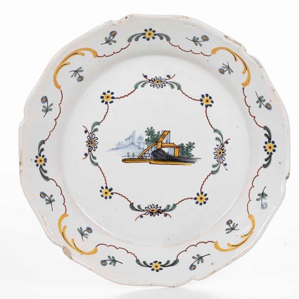 Piatto <BR>Francia, probabilmente Manifattura di Moulins (Alvernia-Rodano-Alpi), XVIII secolo  - Asta Bacili da barbiere, bacinelle e fioriere in maiolica francese da collezione - Associazione Nazionale - Case d'Asta italiane