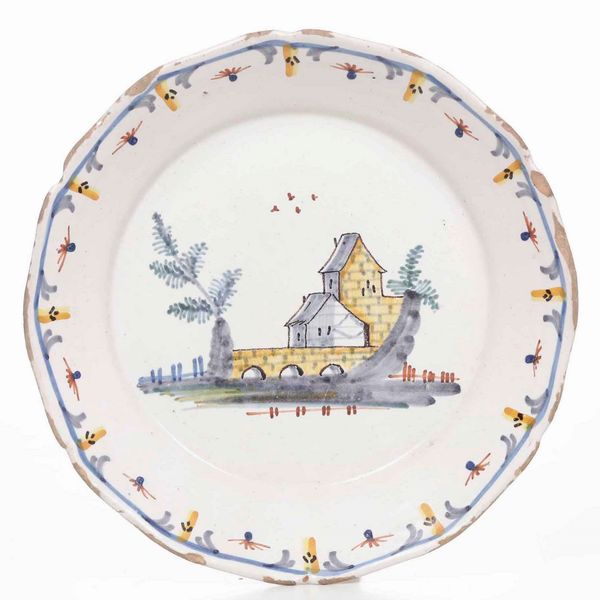 Piatto <BR>Francia, Manifattura di Nevers, fine del XVIII secolo  - Asta Bacili da barbiere, bacinelle e fioriere in maiolica francese da collezione - Associazione Nazionale - Case d'Asta italiane