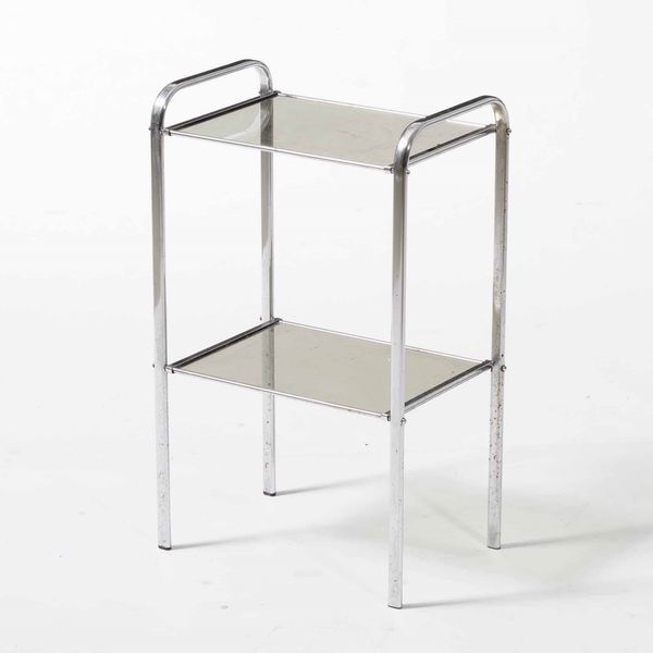 Tavolino in metallo cromato con due ripiani in vetro fum�  - Asta Antiquariato Settembre - Associazione Nazionale - Case d'Asta italiane