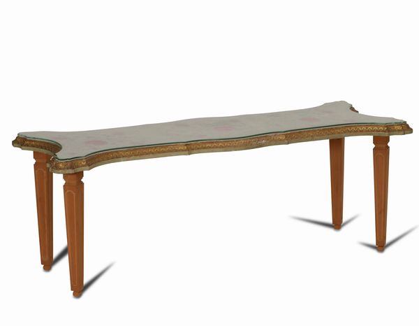 Tavolo in legno intagliato, dipinto e piano in vetro, XX secolo  - Asta Antiquariato Settembre - Associazione Nazionale - Case d'Asta italiane