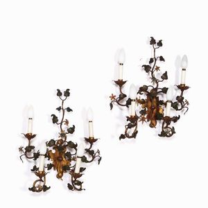 Coppia di appliques a quattro luci in ferro decorate a motivi fogliati  - Asta Antiquariato Settembre - Associazione Nazionale - Case d'Asta italiane
