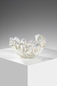 BAROVIER ERCOLE (1889 - 1974) - Conchiglia in vetro costolato trasparente, superficie iridata