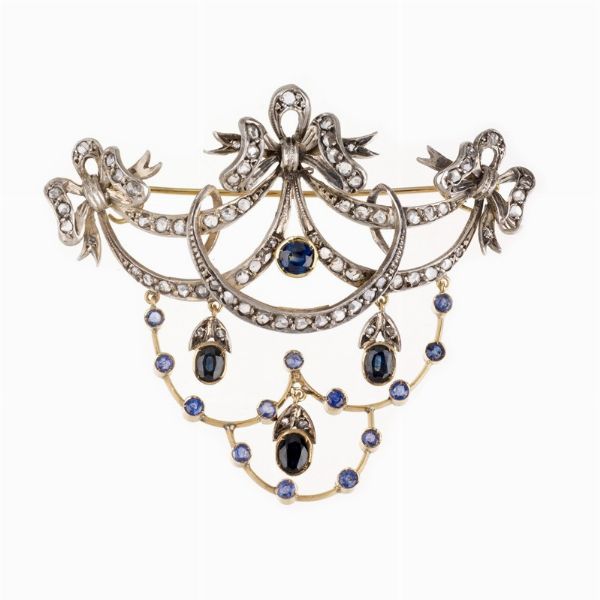 SPILLA A FESTONE CON ZAFFIRI E DIAMANTI  - Asta Gioielli  - Associazione Nazionale - Case d'Asta italiane