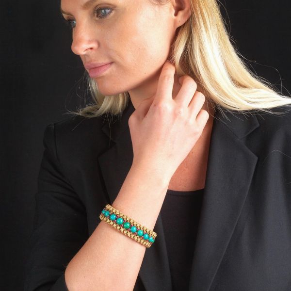 BRACCIALE A FASCIA CON TURCHESI E RUBINI  - Asta Gioielli  - Associazione Nazionale - Case d'Asta italiane