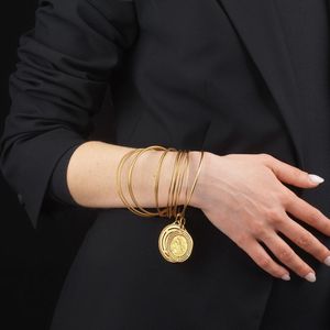 BRACCIALI RIGIDI CON MONETE  - Asta Gioielli  - Associazione Nazionale - Case d'Asta italiane