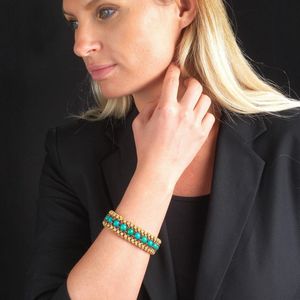 BRACCIALE A FASCIA CON TURCHESI E RUBINI  - Asta Gioielli  - Associazione Nazionale - Case d'Asta italiane