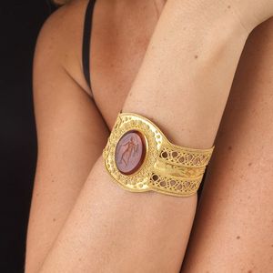 BRACCIALE RIGIDO STILE ARCHEOLOGICO MICROGRANULATO  - Asta Gioielli in stile archeologico  - Associazione Nazionale - Case d'Asta italiane