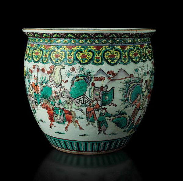 Cachepot in porcellana Famiglia Verde raffigurante scontro tra cavalieri e figure di koi fish all'interno, Cina, Dinastia Qing, epoca Daoguang (1821-1850)  - Asta Fine chinese works of art - Associazione Nazionale - Case d'Asta italiane