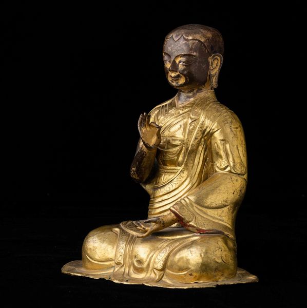 Figura di monaco in rame parzialmente dorato con tracce di policromia, Tibet, XVIII secolo  - Asta Fine chinese works of art - Associazione Nazionale - Case d'Asta italiane