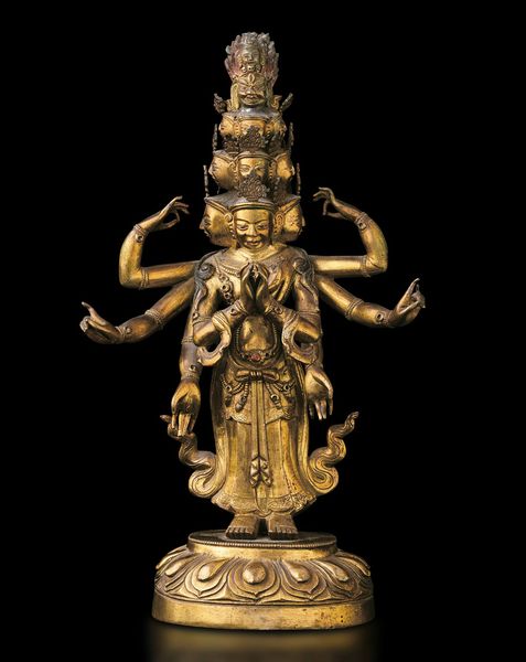 Figura di Ekadasamukha-Avalokitesvara eretto su fiore di loto in bronzo dorato con tracce di policromia e innesti di pietre dure, Tibet, XVIII secolo  - Asta Fine chinese works of art - Associazione Nazionale - Case d'Asta italiane
