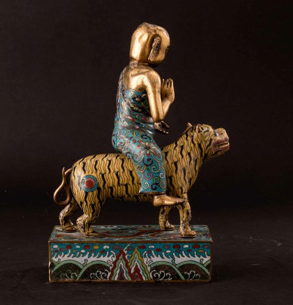 Gruppo a smalti cloisonn� raffigurante saggio su tigre, Cina, Dinastia Qing, epoca Qianlong (1736-1796)  - Asta Fine chinese works of art - Associazione Nazionale - Case d'Asta italiane
