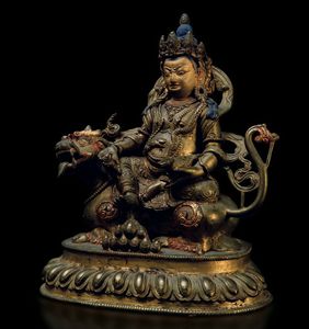 Figura di Sita-Jambhala seduto su drago in bronzo dorato con tracce di policromia, Cina, Dinastia Qing, epoca Qianlong (1736-1796)  - Asta Fine chinese works of art - Associazione Nazionale - Case d'Asta italiane