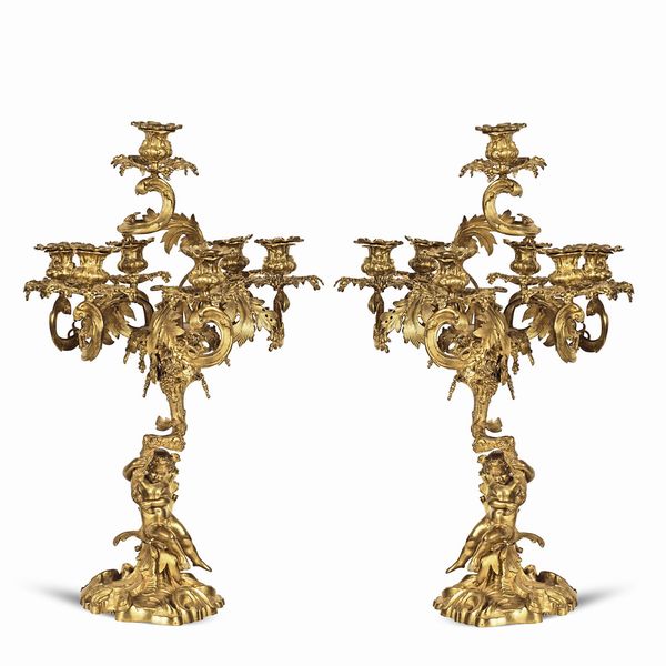 Coppia di candelabri a sette luci in bronzo dorato  - Asta Da Importanti Collezioni Romane - Associazione Nazionale - Case d'Asta italiane