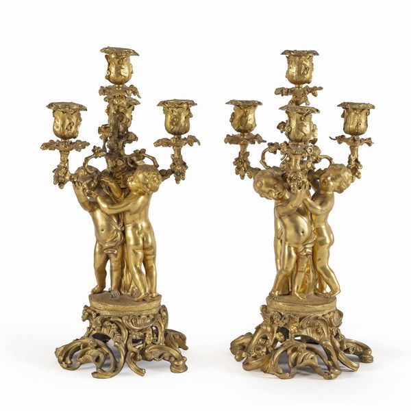 Coppia di candelabri  in bronzo dorato e cesellato  - Asta Da Importanti Collezioni Romane - Associazione Nazionale - Case d'Asta italiane
