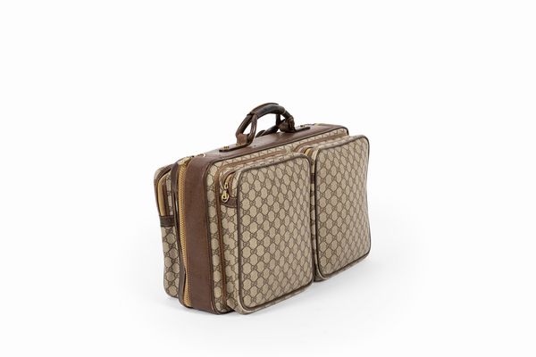 GUCCI : Valigia con logo GG  - Asta Luxury Fashion - Associazione Nazionale - Case d'Asta italiane